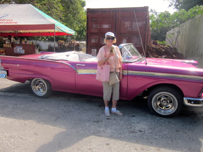 Channel and her mom by a classic car, used as a taxi.   Enjoy the ride, Channel